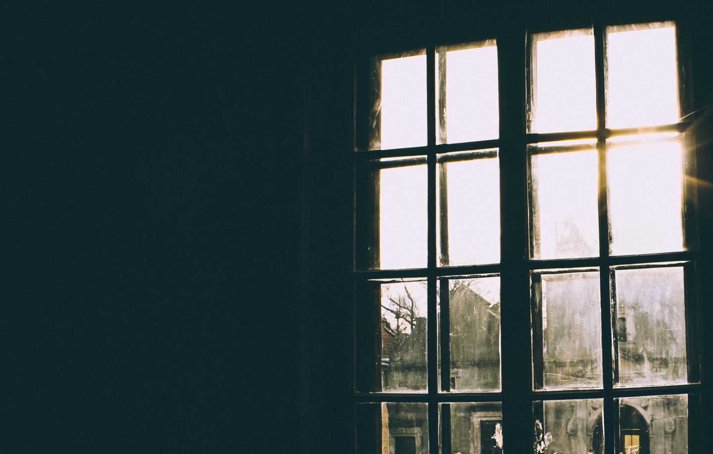Dark room with bright window